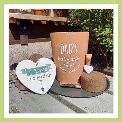 1 x Terracotta Plant Pot with the sentiment 'Dad's Herb Garden' and displaying other gifts