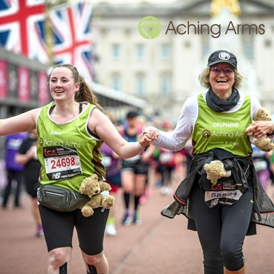 two ladies running for Aching Arms in the TCS London Marathon 2023